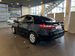 2014 Kia Rio 4-speed III, чёрный, 711000 рублей, вид 5