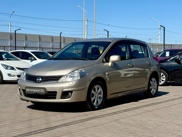 2010 Nissan Tiida I Рестайлинг, коричневый, 679990 рублей - вид 2