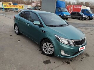 2012 Kia Rio 5-speed III, зелёный, 693150 рублей, вид 5