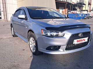 2012 Mitsubishi Lancer X Рестайлинг, серебристый, 895000 рублей, вид 1