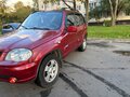 2011 Chevrolet Niva I Рестайлинг, красный - вид 5