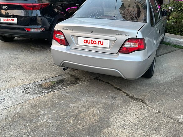 2010 Daewoo Nexia I Рестайлинг, серебристый - вид 1