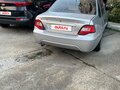 2010 Daewoo Nexia I Рестайлинг, серебристый - вид 1