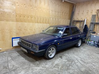 1986 Nissan Laurel V (C32), синий, 690000 рублей, вид 1