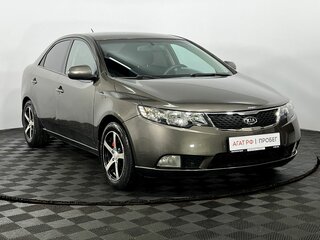 2010 Kia Cerato 5-speed II, коричневый, 660000 рублей, вид 4