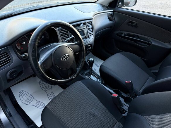 2010 Kia Rio II Рестайлинг, серебристый - вид 12