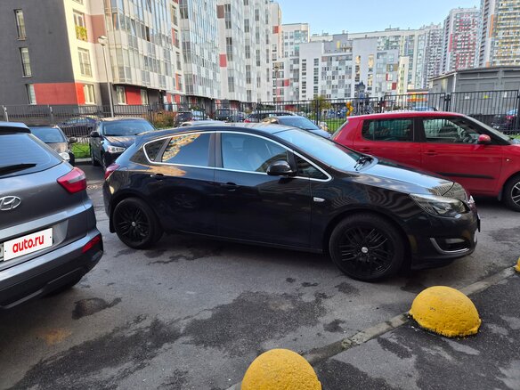 2014 Opel Astra J Рестайлинг, чёрный, 850000 рублей - вид 3
