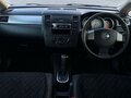 2010 Nissan Tiida I Рестайлинг, белый, 570000 рублей - вид 5