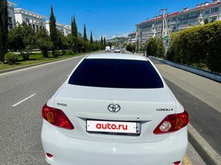2010 Toyota Corolla X (E140, E150), белый, 1055000 рублей, вид 3
