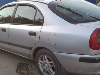 2001 Mitsubishi Carisma I Рестайлинг, серебристый, 310000 рублей, вид 4