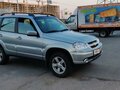 2015 Chevrolet Niva I Рестайлинг, серый, 795000 рублей - вид 1