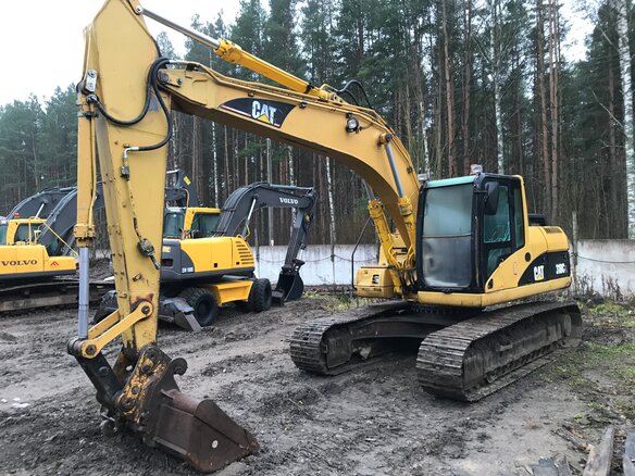 2006 Caterpillar 318, жёлтый