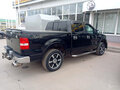 2005 Ford F-150 XI, чёрный - вид 2