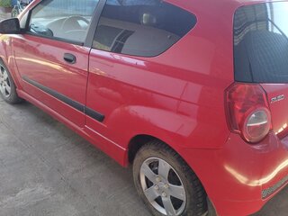 2010 Chevrolet Aveo I Рестайлинг, красный, 430000 рублей, вид 3