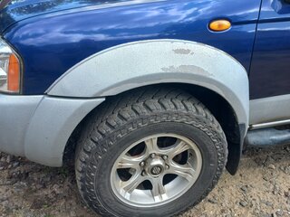 2004 Nissan Navara (Frontier) II (D22), синий, 768756 рублей, вид 4