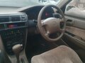 1997 Toyota Corolla VII (E100), белый, 350000 рублей - вид 5