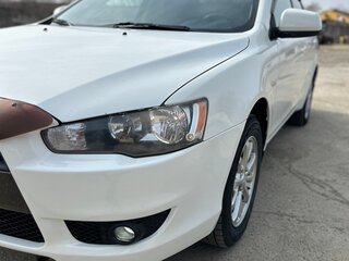 2010 Mitsubishi Lancer X, белый, 810000 рублей, вид 3