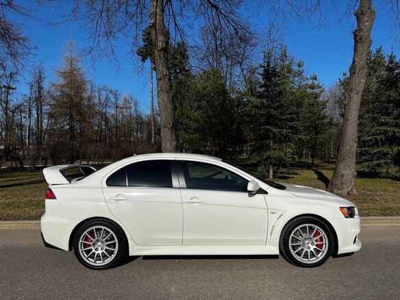 2014 Mitsubishi Lancer Evolution X, белый - вид 4