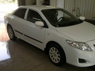 2010 Toyota Corolla X (E140, E150) Рестайлинг, белый, 1100000 рублей, вид 1