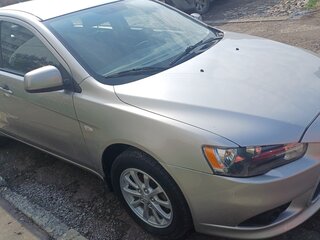 2012 Mitsubishi Lancer X Рестайлинг, серебристый, 950000 рублей, вид 3