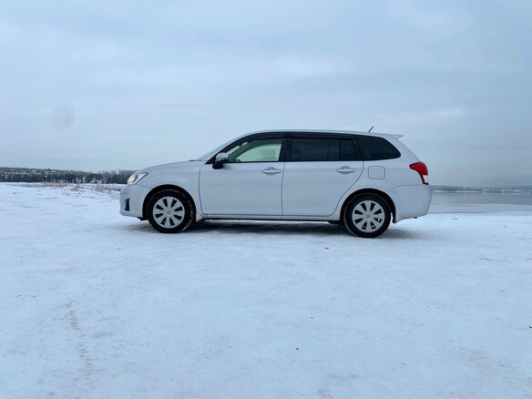 2014 Toyota Corolla Fielder XI (E160, E170, E180), серебристый, 1320000 рублей - вид 5