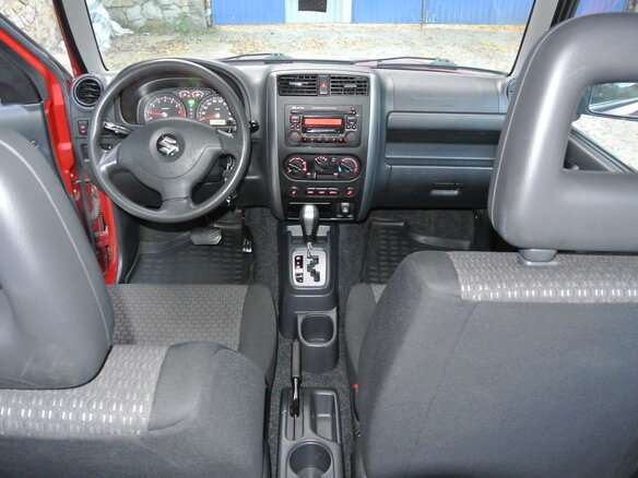 2011 Suzuki Jimny III Рестайлинг 1, красный - вид 3