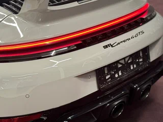 2024 Porsche 911 Carrera 4 GTS VIII (992) Рестайлинг, серый, 28500000 рублей, вид 2