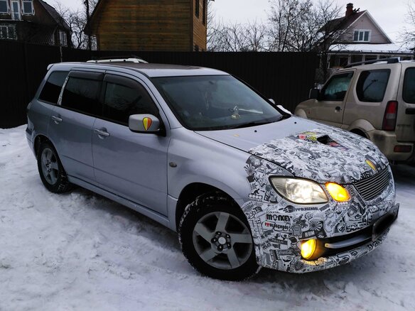 2003 Mitsubishi Airtrek I, серебристый - вид 5