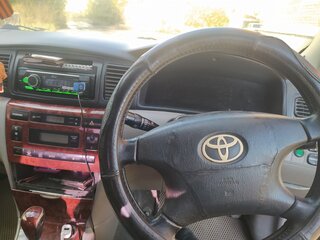2001 Toyota Corolla IX (E120, E130), зелёный, 375000 рублей, вид 2