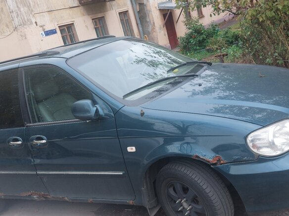 2004 Kia Carnival I Рестайлинг, зелёный, 380000 рублей - вид 3