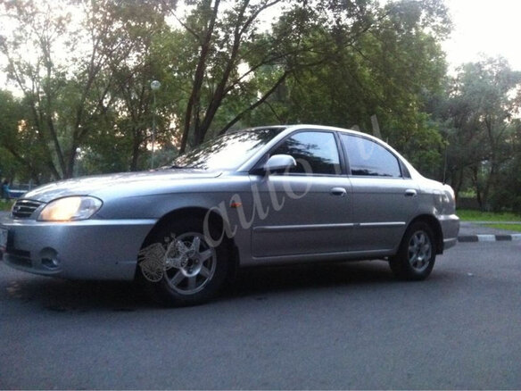 2007 Kia Spectra I Рестайлинг 2, серебристый - вид 1