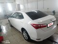 2016 Toyota Corolla XI (E160, E170, E180) Рестайлинг 1, белый, 1799000 рублей - вид 2
