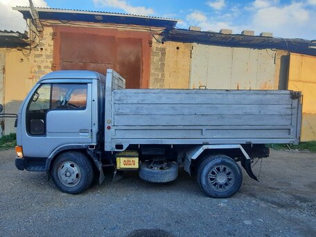1994 Nissan Atlas, серый, 1665000 рублей, вид 2
