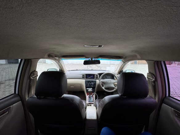 2002 Toyota Corolla IX (E120, E130), белый, 385000 рублей - вид 4