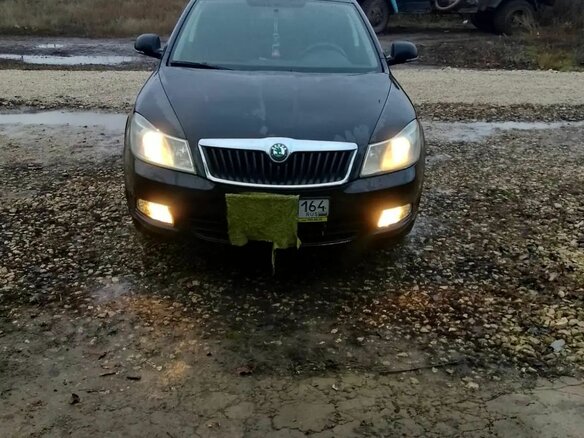 2013 Skoda Octavia II (A5) Рестайлинг, чёрный, 920000 рублей