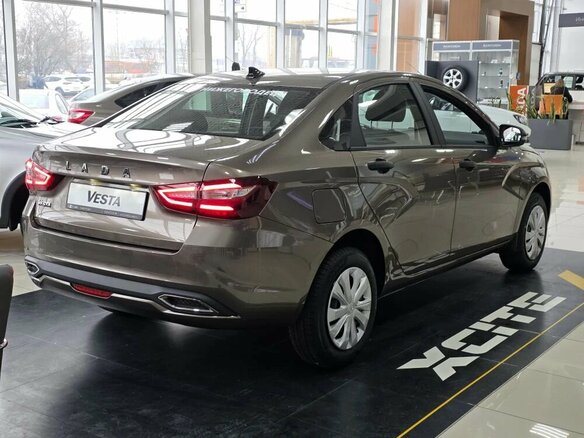2026 Lada (ВАЗ) Vesta I Рестайлинг (NG), коричневый, 1601000 рублей - вид 1