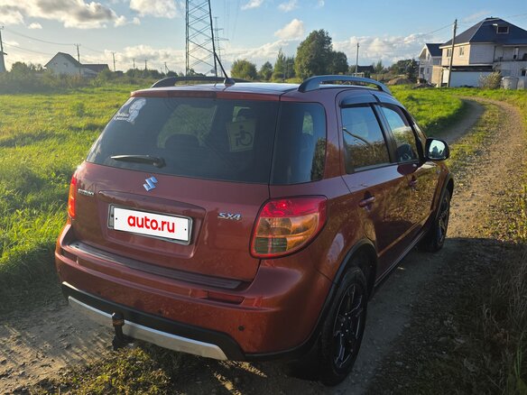 2010 Suzuki SX4 I (Classic) Рестайлинг, оранжевый, 645000 рублей - вид 7
