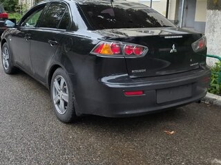 2010 Mitsubishi Lancer X, чёрный, 750000 рублей, вид 3