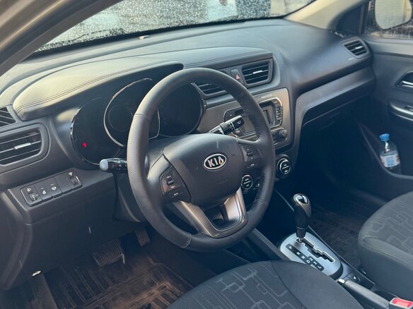 2012 Kia Rio 4-speed III, бежевый - вид 10