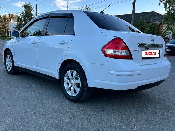 2008 Nissan Tiida I, белый, 720000 рублей - вид 5