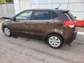 2017 Kia Rio III Рестайлинг, коричневый, 750000 рублей - вид 9