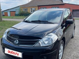 2011 Nissan Tiida I Рестайлинг, чёрный, 750000 рублей, вид 1