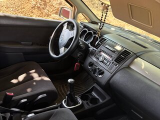 2012 Nissan Tiida I, серебристый, 799000 рублей, вид 3