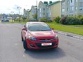 2012 Opel Astra J Рестайлинг, красный, 840000 рублей