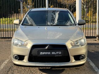 2010 Mitsubishi Lancer X, бежевый, 879000 рублей, вид 2