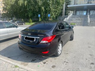 2011 Hyundai Solaris I, чёрный, 810000 рублей, вид 3