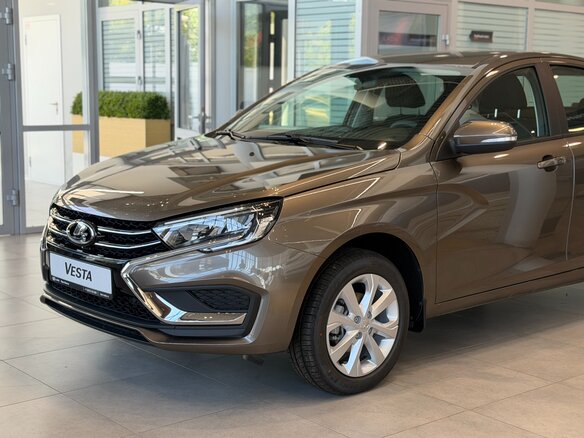 2026 Lada (ВАЗ) Vesta I Рестайлинг (NG), коричневый, 1862000 рублей - вид 1