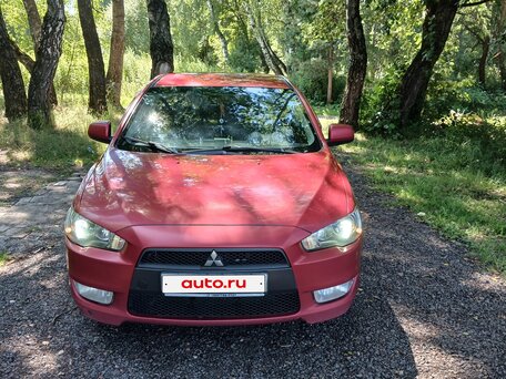2010 Mitsubishi Lancer X, красный, 615000 рублей, вид 3