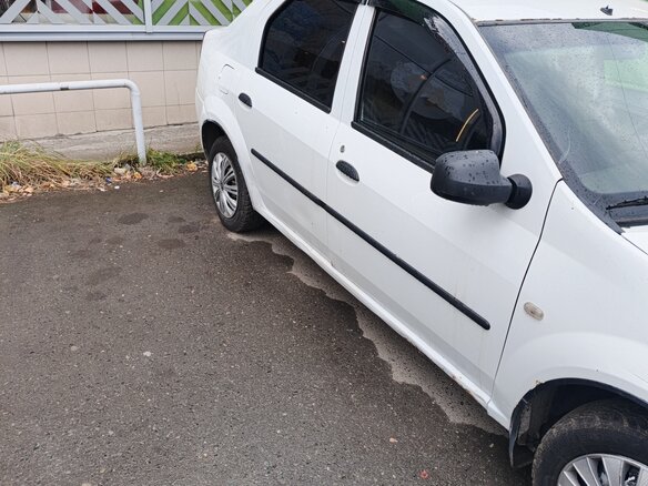 2010 Renault Logan I Рестайлинг, белый - вид 3