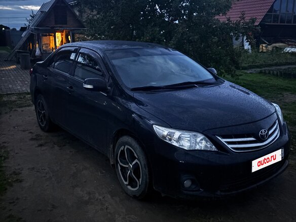 2012 Toyota Corolla X (E140, E150) Рестайлинг, чёрный - вид 1